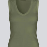 Ærmeløs grøn top i ribbed bomuldsjersey. Igormd tank top har en tætsiddende pasform og en rund halsudskæring. cropped pasform med lange ærmer.