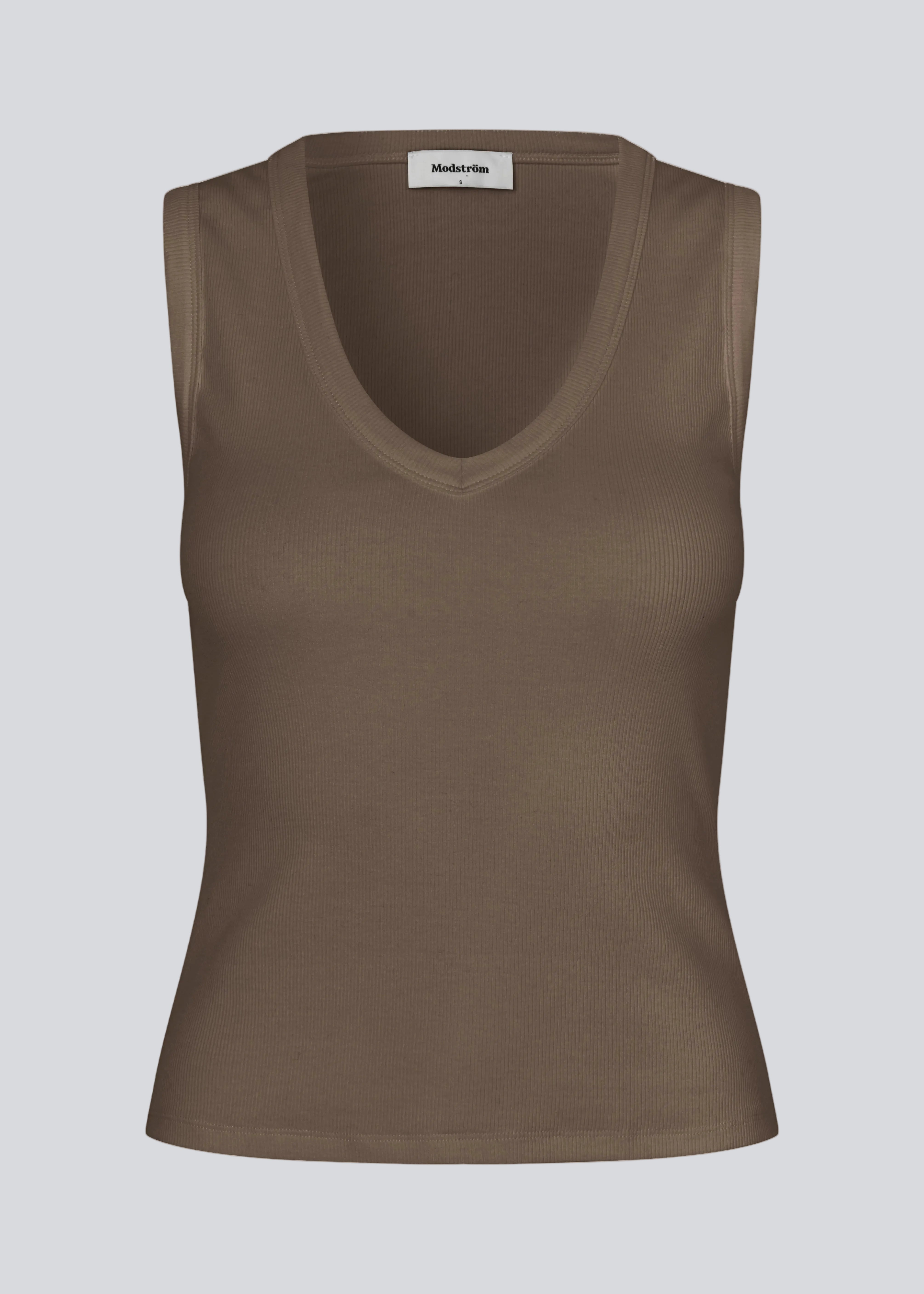 Ærmeløs brun top i ribbed bomuldsjersey. Igormd tank top har en tætsiddende pasform og en rund halsudskæring. cropped pasform med lange ærmer.
