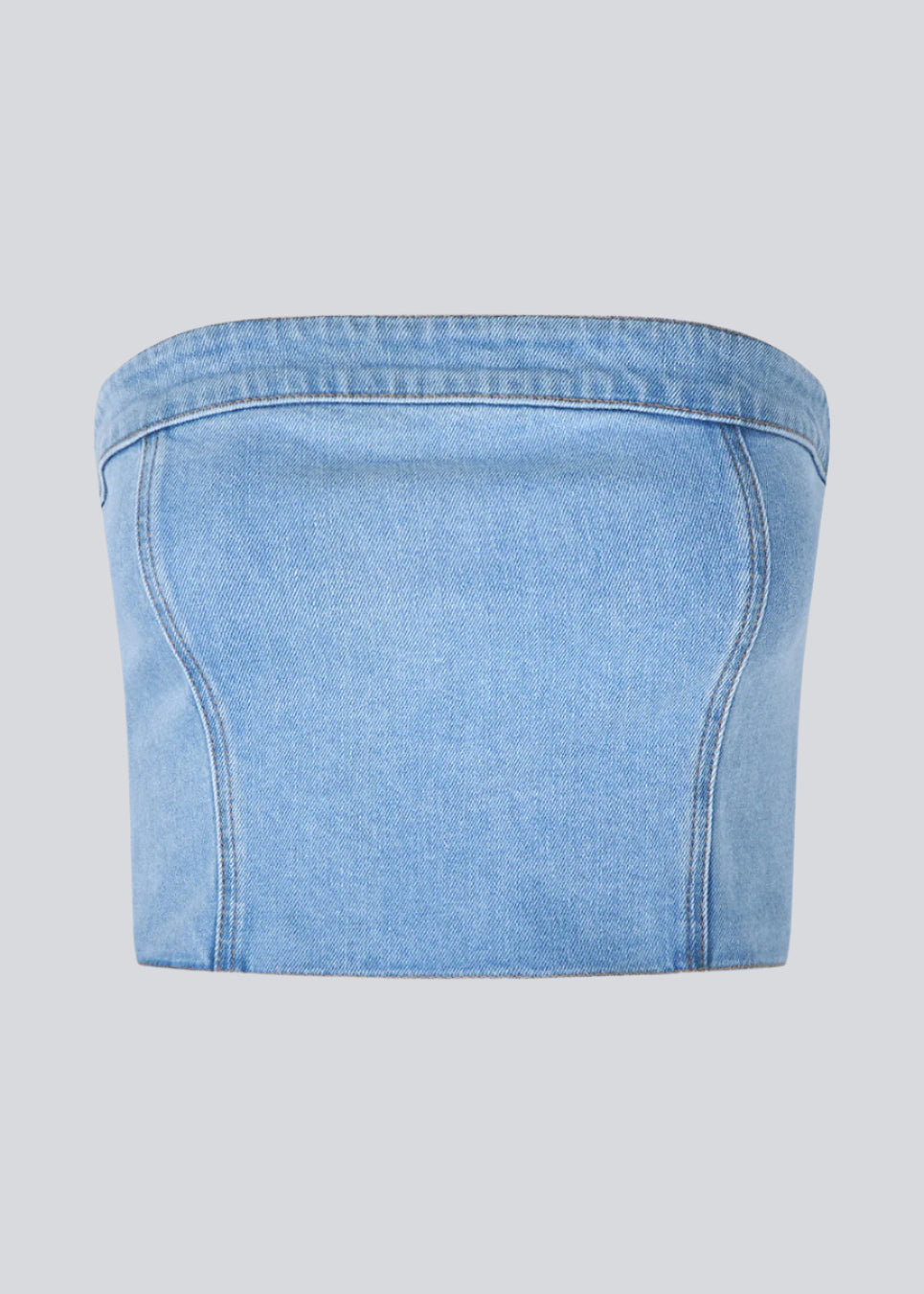 Kort denim top i corset design. IvannaMD top er fremstillet i lys denim og har en lynlåslukning i ryggen.