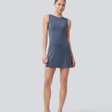 Figursyet mini kjole i mørkeblå/mørkegrå i A-facon uden ærmer med rund hals. JosefineMD tank flare dress er fremstillet i et strækbart materiale.