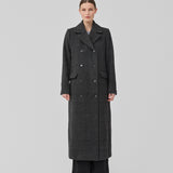 Klassisk, dobbeltradet uldfrakke i mørkegrå med krave og revers. JuniperMD check coat har en afslappet pasform, foer og en slids bagpå.