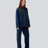 Klassisk skjort i denim med nitter detaljer. LuccaMD shirt har en klassisk skjortekrave, to forlommer og knappelukning.