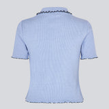 Figursyet polo i jersey. MagdaloneMD polo har korte ærmer og overlockede kanter. 