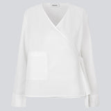 Langærmet bluse med wrap detalje. MalleMD shirt har brede ærmer, en lomme fortil og lukkes med et bindebånd i siden. 