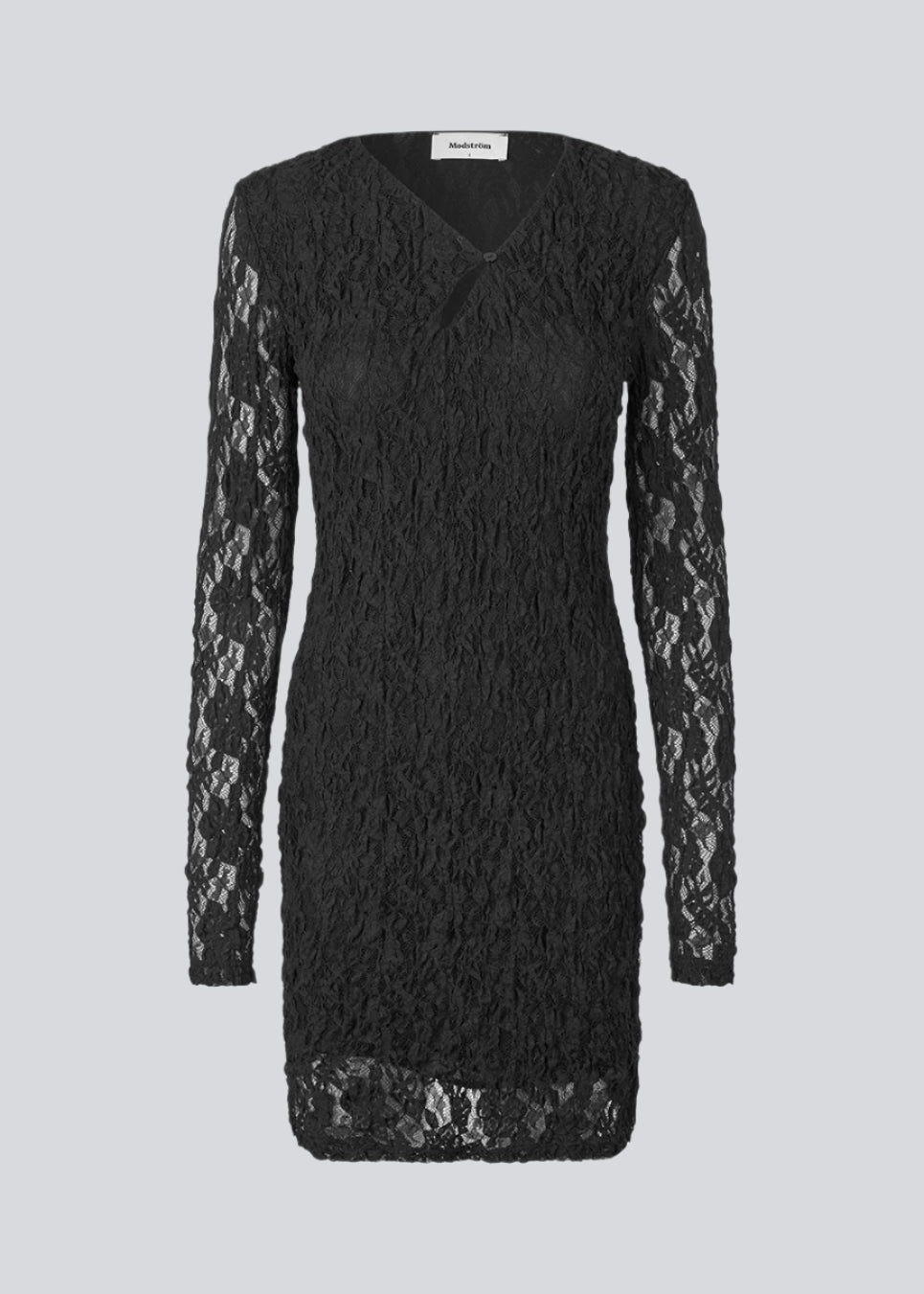 Kort figursyet kjole i elastisk blondemateriale. MalmunMD dress har en asymmetrisk halsudskæring med en åbning med knappelukning.