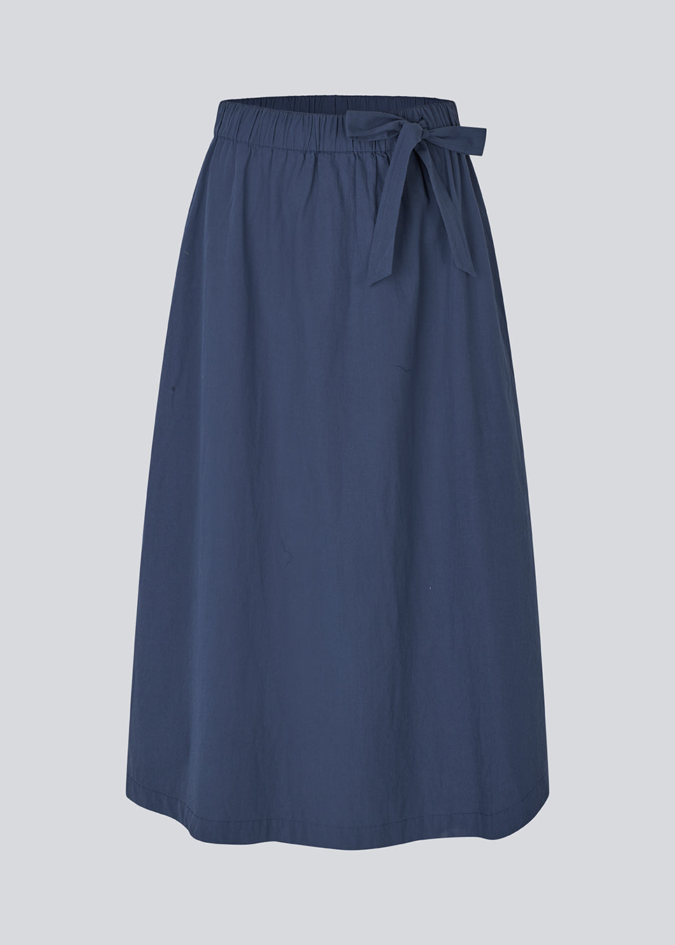 Mellem lang nederdel i 100% økologisk bomuld. MaudeMD skirt har en a form og en elastisk talje med bindebånd. 