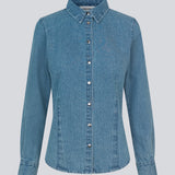 Blød denim skjorte i 100% bomuldsdenim. MinniMD shirt er figursyet og har en knappelukning fortil og skjortekrave.