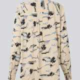 Klassisk skjorte med løs pasform. MistMD print shirt har lange ærmer, skjorte krave og en klappelukning fortil.