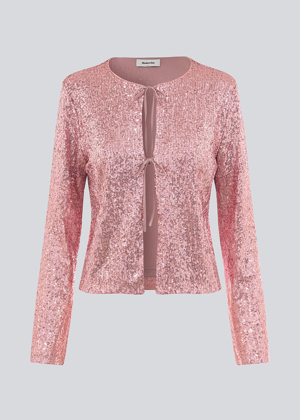 Pink langærmet cardigan med palietter. MulanMD top har lange brede ærmer, er let cropped og har 2 bindebånd fortil.