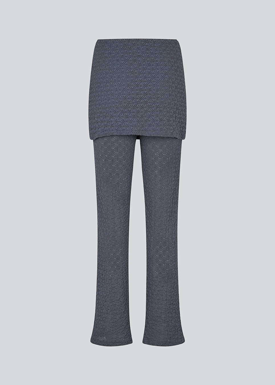 Lange flared bukser med nederdel. MynteMD pants er lavet i et elastisk og struktureret materiale og har elastik i taljen.