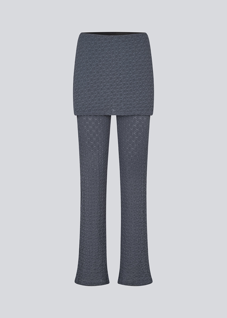 Lange flared bukser med nederdel. MynteMD pants er lavet i et elastisk og struktureret materiale og har elastik i taljen.