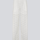 Hvide bukser med vide ben i broderie angalise. NanetteMD pants har en elastisk talje og foer.