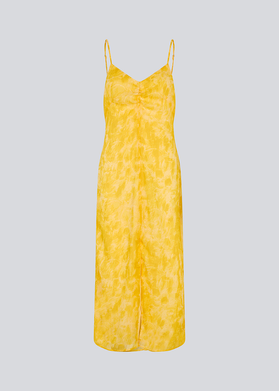 Lang kjole i smuk gul med tynde justerbare stropper og rynkedetalje ved brystet. Napthalimd print strap dress har en slids i front og en usynlig lynlås i ryggen.