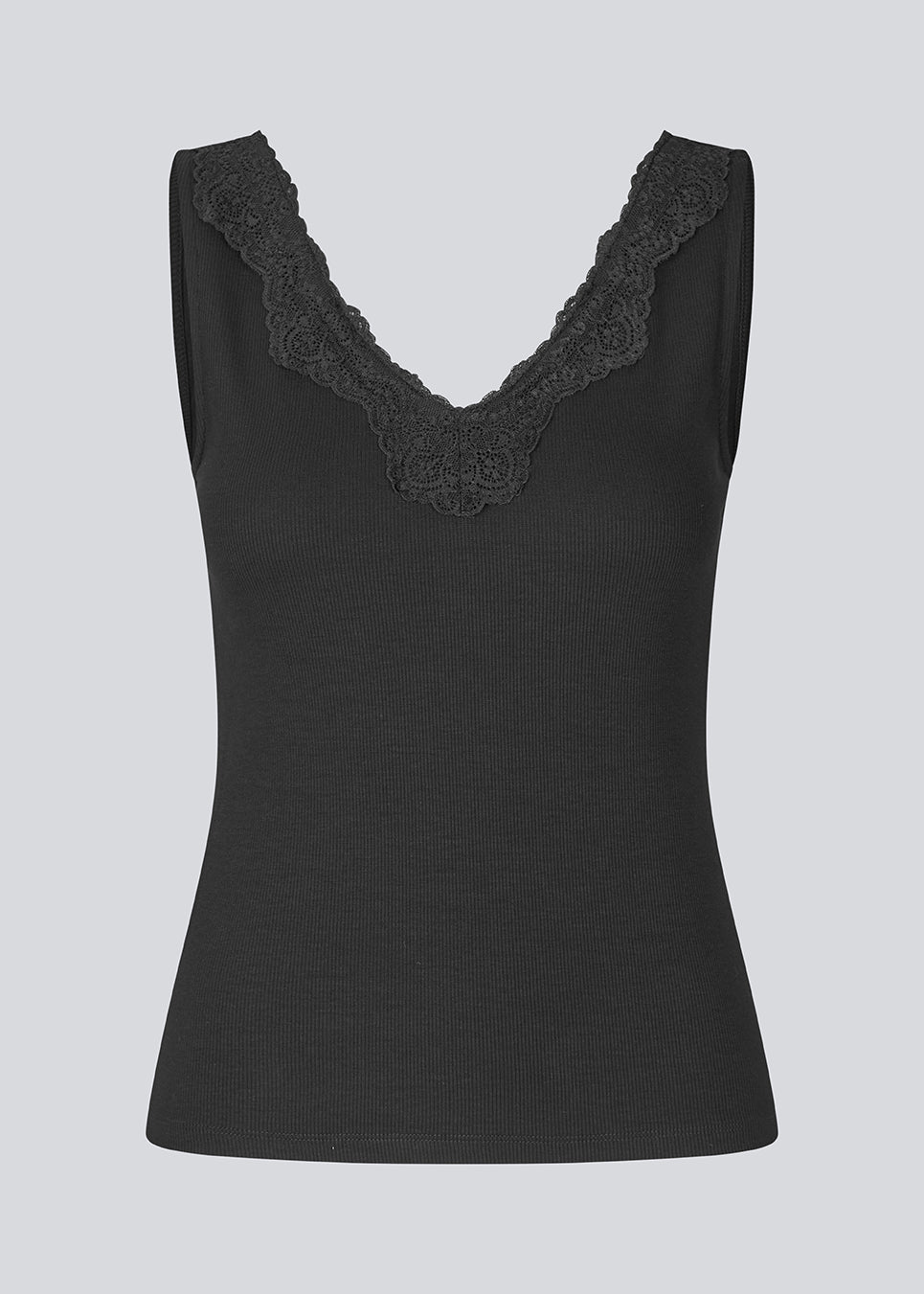 Ærmeløs top med blondekant i ribbed jersey. NemiMD top er figursyet og har en v-udskæring.