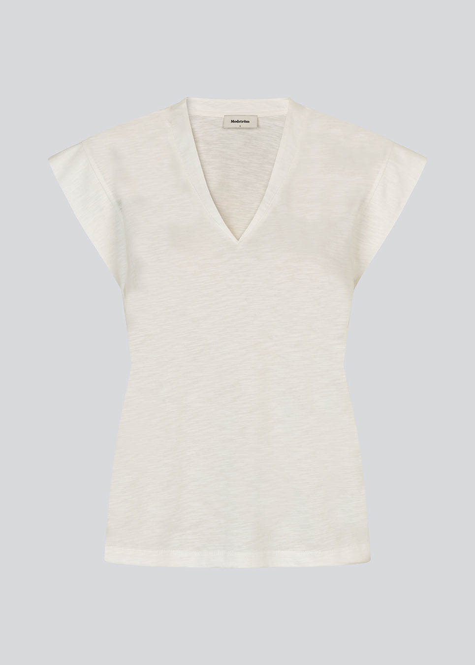 Kortærmet hvid t-shirt i 100% organic cotton. Neomamd t-shirt har en v-udskæring og en løs pasform.