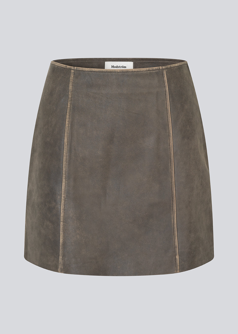 Klassisk kort a-formet læder-nederdel i Lammelæder medmellemhøj talje. NimaMD skirt haret vintage-inspireret look og en skjult lynlås isiden.