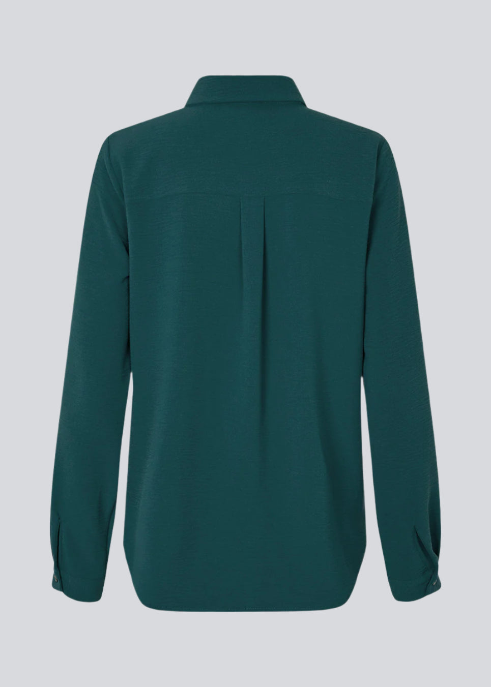 Klassisk skjorte i en løs og afslappet pasform. Ossa shirt har en lille krave, smal manchet og knapper i matchende farve for et ensartet design.