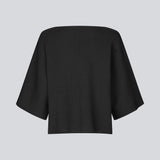 Strikket cardigan i sort med korte ærmer i EcoVero viscose. Parismd SS cardigan har en v-udskæring og knappelukning fortil.&nbsp;