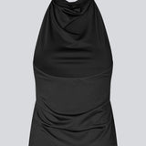 Figursyet halterneck top uden ærmer. Parissamd top har vandfaldsdetaljer fortil og en åben ryg. Modellen er 175 cm og har en str. S/36 på.