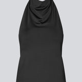 Figursyet halterneck top uden ærmer. Parissamd top har vandfaldsdetaljer fortil og en åben ryg. Modellen er 175 cm og har en str. S/36 på.