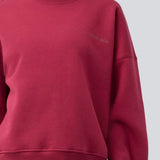 Sweatshirt i mørkerød i bomuldsblanding med logo. Paulamd sweat &nbsp;har en rund halsudskæring og ribkant vedbåde &nbsp;bund og ærmer. Modellen er 175 cm og har en str S/36 &nbsp;på.