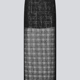 Lang nederdel med i et transparant materiale med palietter. Paerleenmd long skirt har foer, en usynlig lynlås i siden og en slids