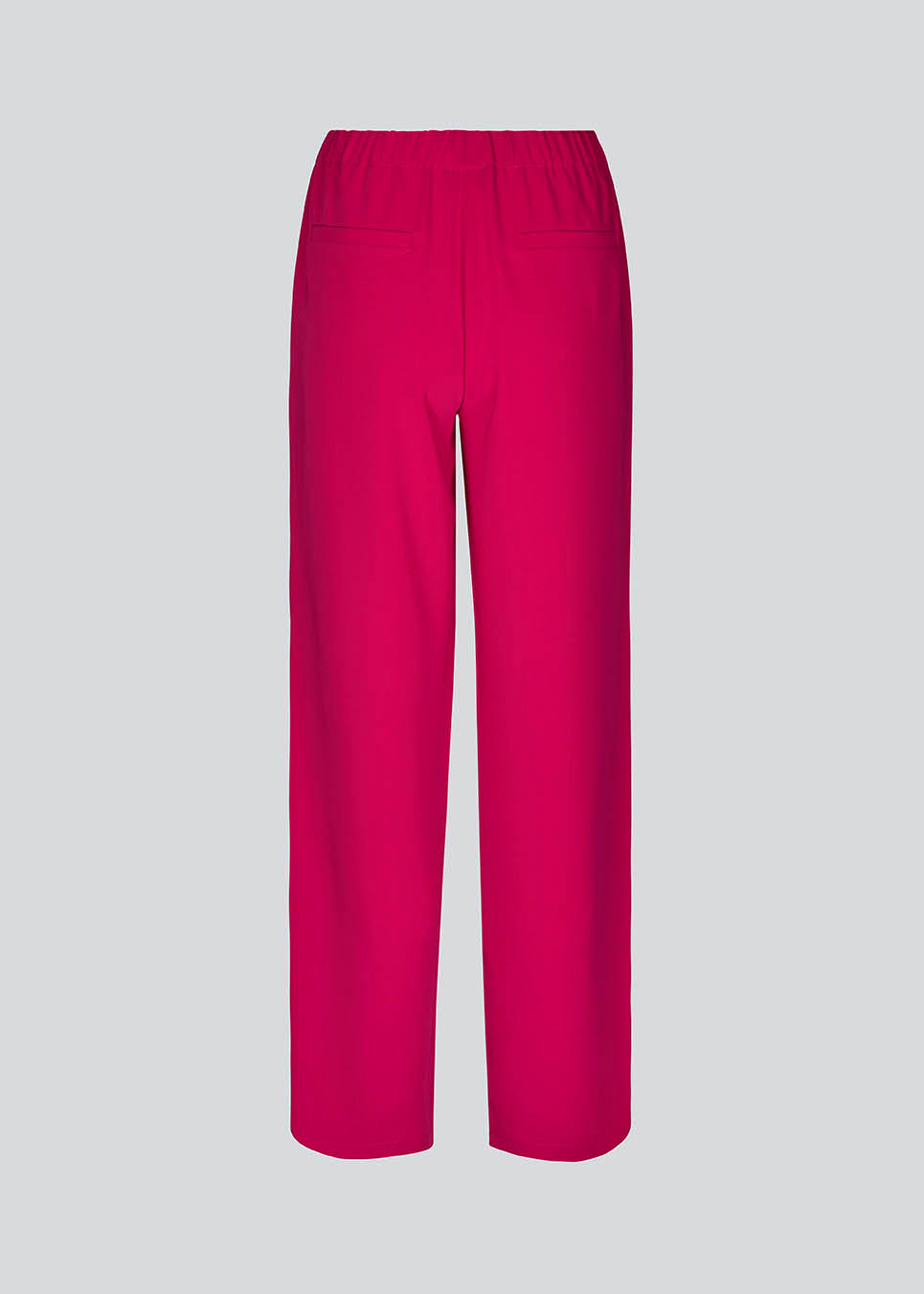 Bukser i pink i et simpelt design med brede ben. Perry pants har skrålommer i siden og en elastisk talje for et behageligt fit. Indersøm (S/36): 81 cm Bukserne forlænges med 0,5 cm for hver størrelse. Modellen er 173 cm og har en størrelse S/36 på