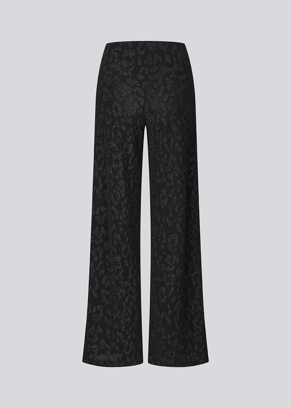 Elastiske sorte bukser med brede ben. Ricardomd pants er stilrene og har et metallic mønster med blomster - perfekte til både hverdag og fest.