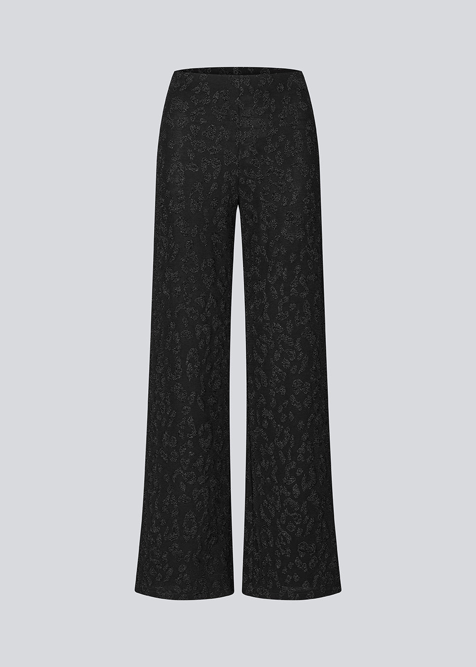 Elastiske sorte bukser med brede ben. Ricardomd pants er stilrene og har et metallic mønster med blomster - perfekte til både hverdag og fest.