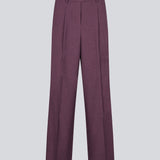 Lilla klassiske habitbukser i genanvendt polyester. Ripley pants har brede ben og pressefolder – elegante og behagelige på samme tid.