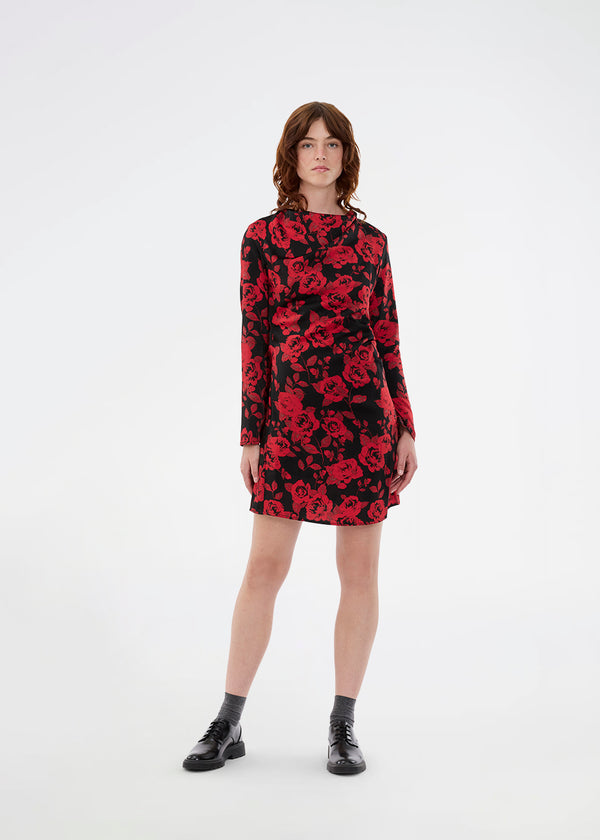Langærmet kjole i et smukt rosenprint. Ruthiemd dress er knælang og er lavet i genanvendt polyester – en klassisk og elegant style.