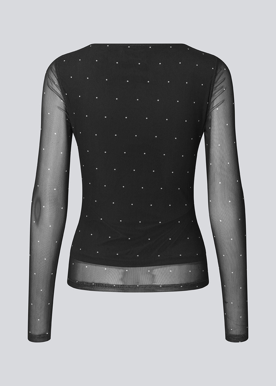 Langærmet mesh-top med prikker. Samalamd print top har en scrunch-detalje foran og en fastsyet undertrøje for et ikke-gennemsigtigt look. Fremstillet i 92 % genanvendt polyester. Perfekt til både hverdag og fest.
