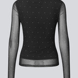 Langærmet mesh-top med prikker. Samalamd print top har en scrunch-detalje foran og en fastsyet undertrøje for et ikke-gennemsigtigt look. Fremstillet i 92 % genanvendt polyester. Perfekt til både hverdag og fest.
