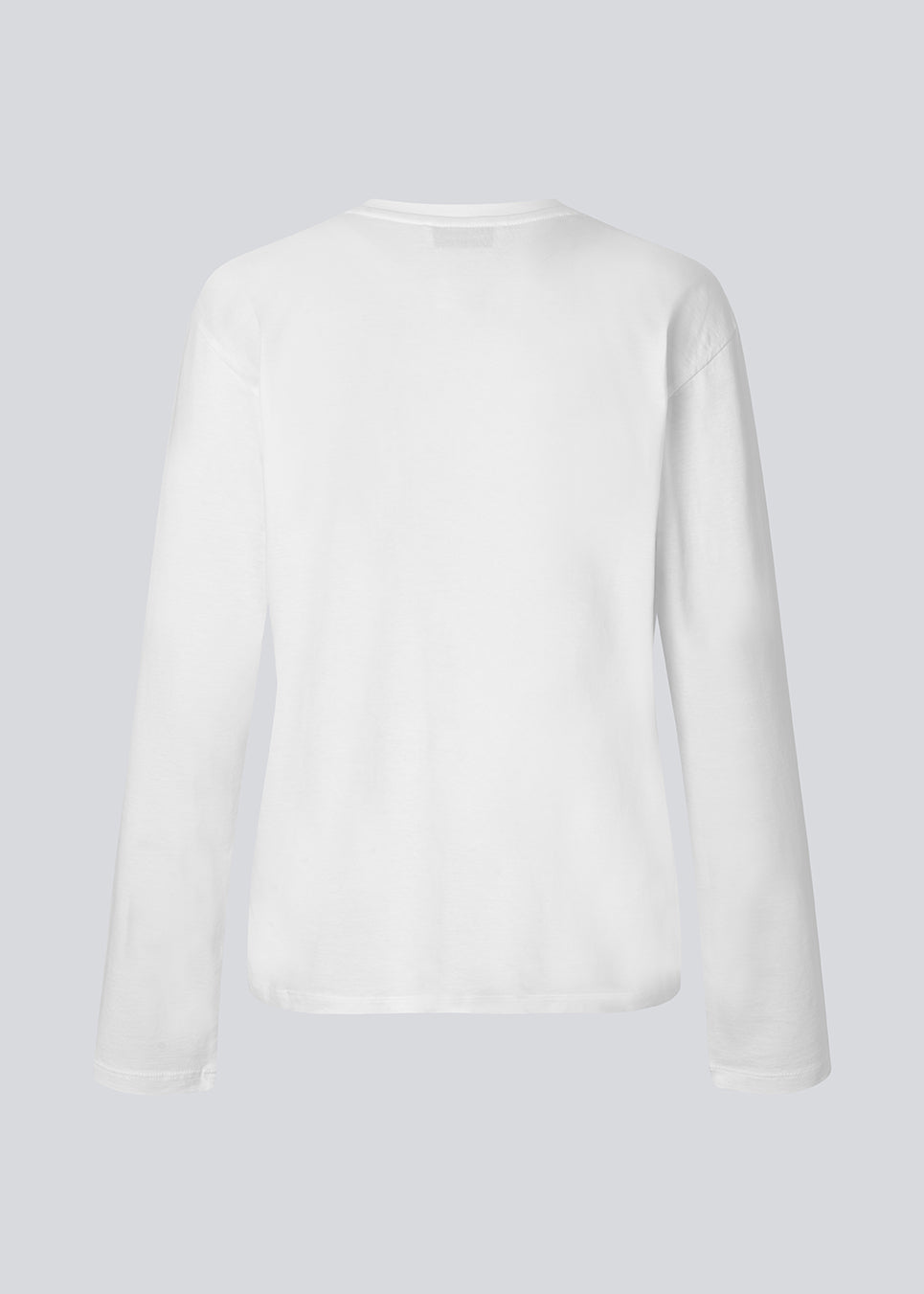 Langærmet hvid T-shirt i 100% økologisk bomuld med "Out of Office"-print på brystet. Sugarmd LS shirt er et casual, men cool valg til hverdagen med citatet i en frisk lyserød farve.