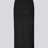 Lang pencil nederdel i jersey med tætsiddende pasform. TannyMD long skirt har høj talje med beklædt elastik og slids midtbag. 