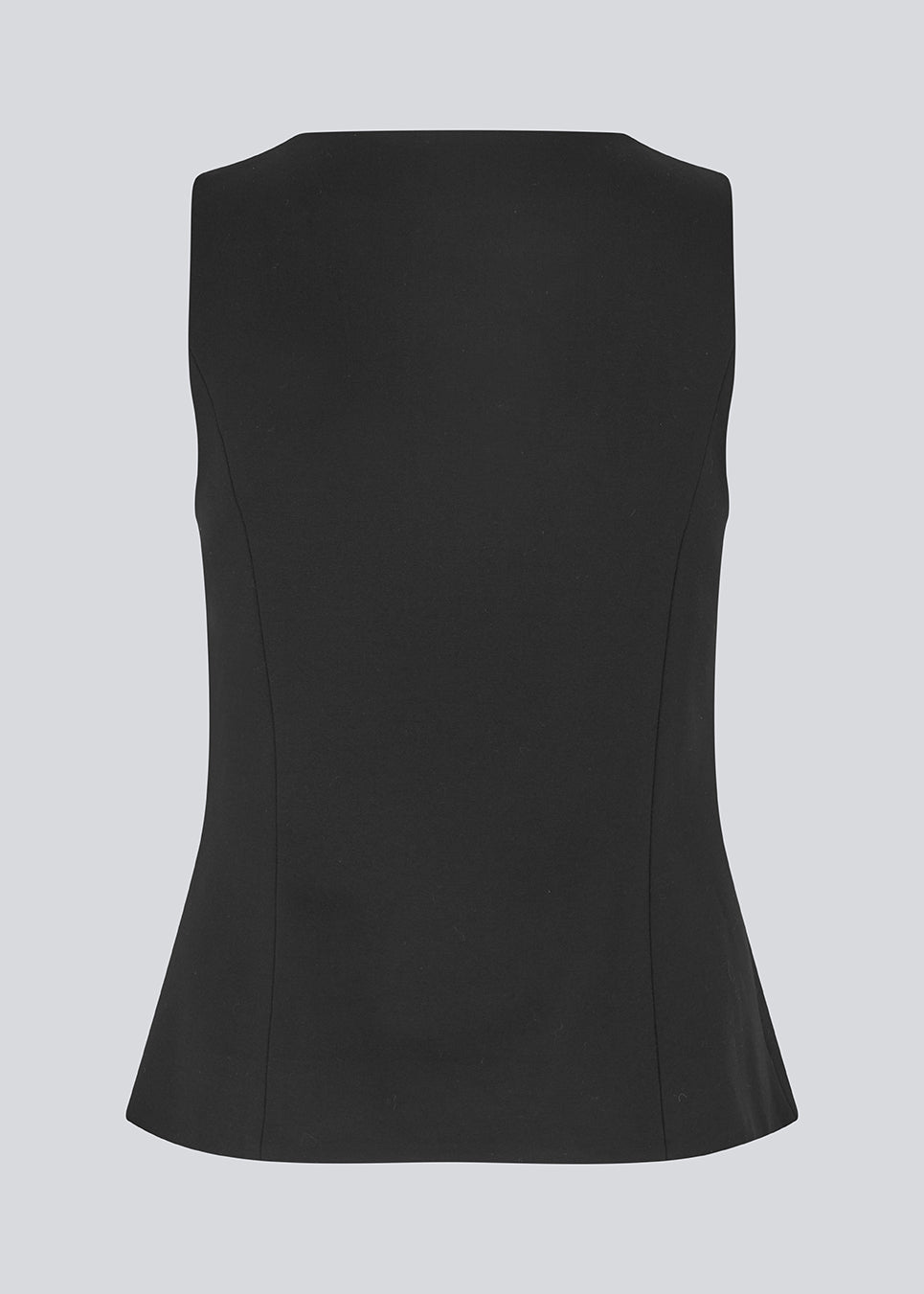 Ærmeløs sort top/vest med knappelukning i jersey. Tannymd &nbsp;top er figursyet og har en rund hals. materiale skaber en perfekt pasform. Modellen er 175 cm og har en str S/36 &nbsp;på.