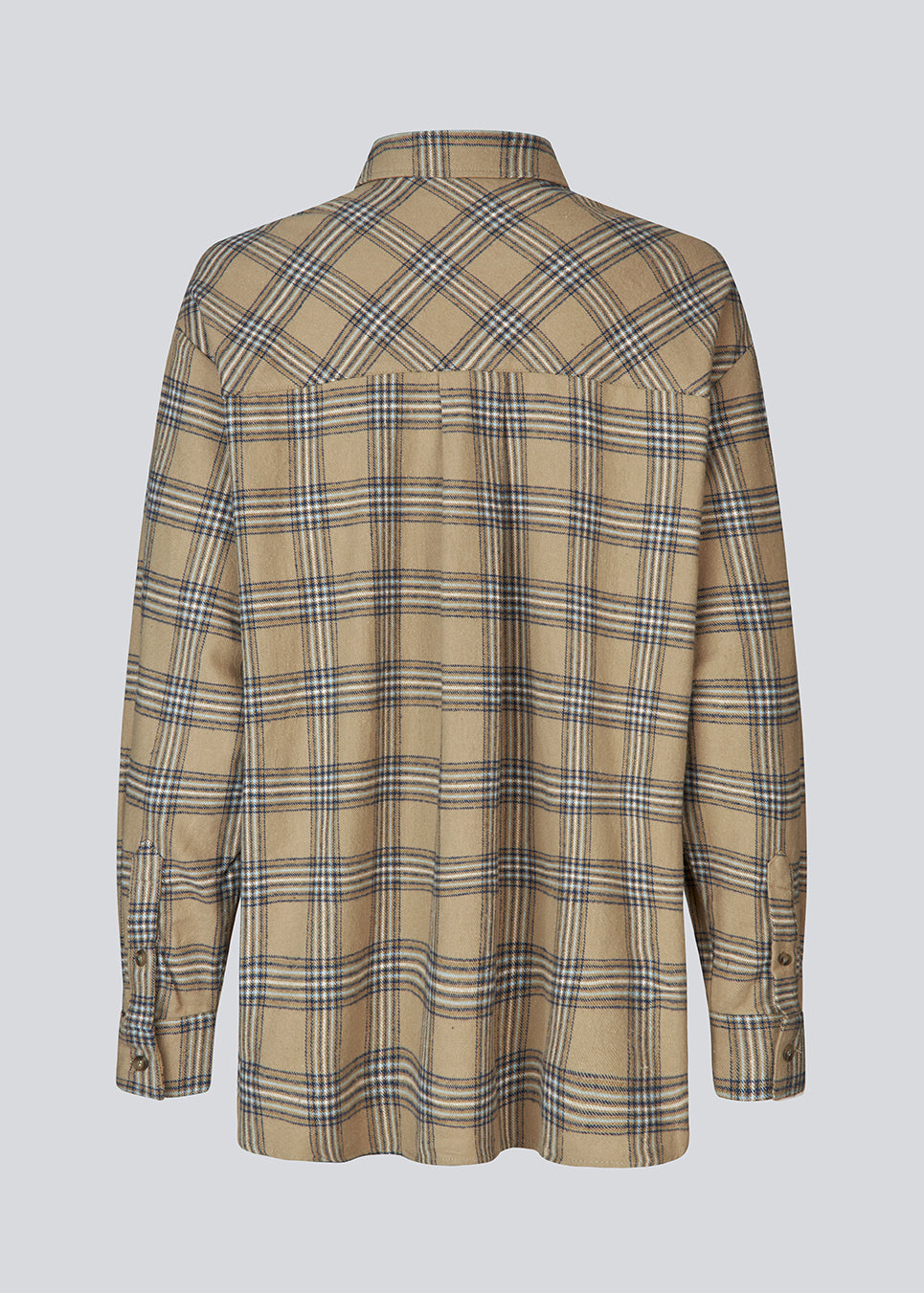 Klassisk oversize skjorte i flannel i beige. TappoMD shirt har en brystlomme knappe lukning fortil og manchet med knappelukning.