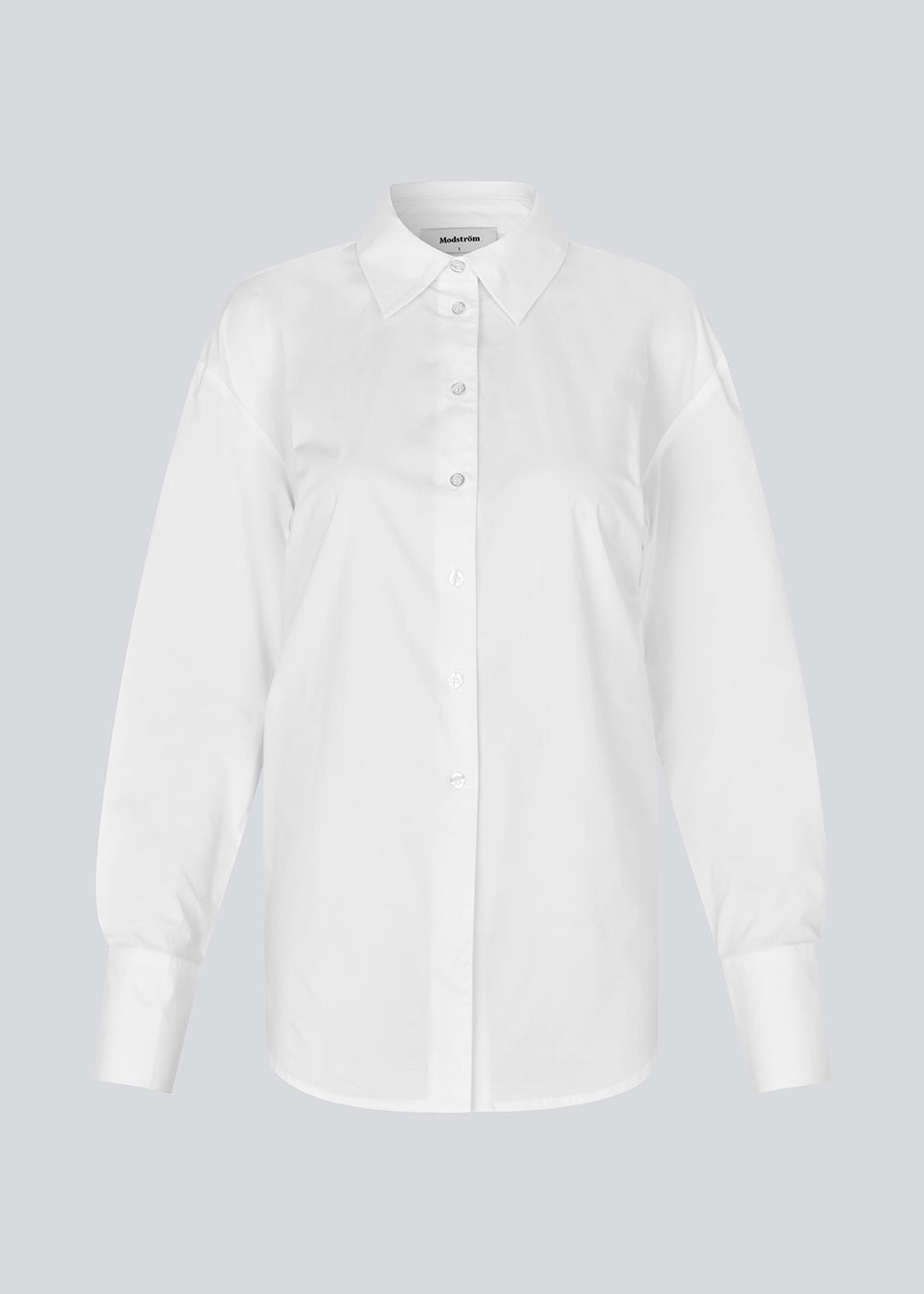 Figursyet hvid skjorte med åben ryg med bindedetalje. Thememd shirt har en skjortekrave og en knappelukning fortil. Modellen er 175 cm og har en str. S/36 på.

Materiale:
97% Bomuld
3% Elastan
