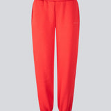 Sweatpants i rød i bomuldsblanding med logo. TiaMD pants har sidelommer, bindebånd og elastik i benene og taljen.&nbsp;