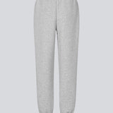 Sweatpants i grå i bomuldsblanding med logo. TiaMD pants har sidelommer, bindebånd og elastik i benene og taljen.