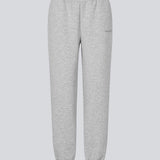 Sweatpants i grå i bomuldsblanding med logo. TiaMD pants har sidelommer, bindebånd og elastik i benene og taljen.
