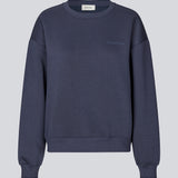 Sweatshirt i mørkeblå i bomuldsblanding med logo. TiaMD sweat har en rund halsudskæring og ribkant ved både bund og ærmer.