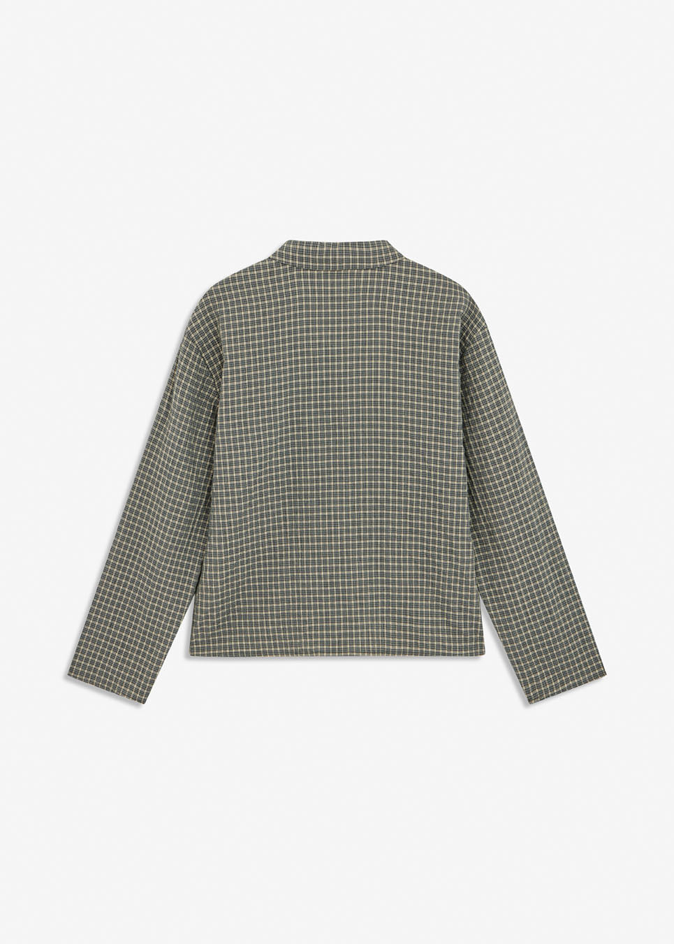 TikkaMD Shirt er en kort skjorte med løs pasform og klassisk ternet mønster. Designet har skjortekrave, skjult knaplukning og en brystlomme. Style den med jeans eller matchende tern for et komplet look.