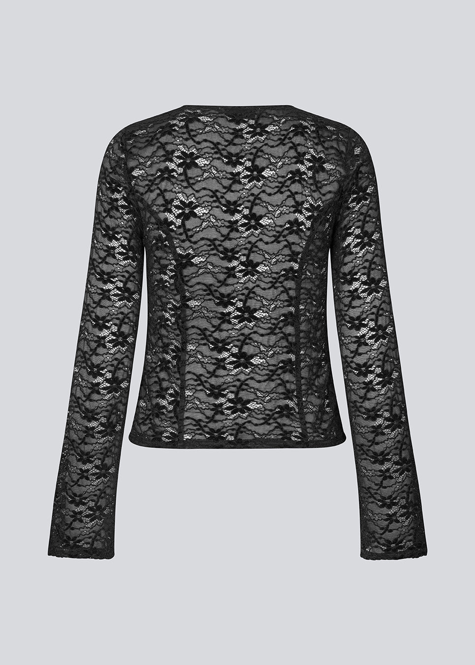 Figursyet top i stretchy blonde med ærmer, der bliver bredere forneden. TildeMD lace top har en dyb V-udskæring og to bindebånd foran.