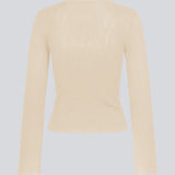 Finstrikket trøje i beige i draperende kvalitet. TomMD o-neck har en let cropped længde med lange ærmer, der bliver bredere forneden. Rib ved halsudskæring og forneden. 