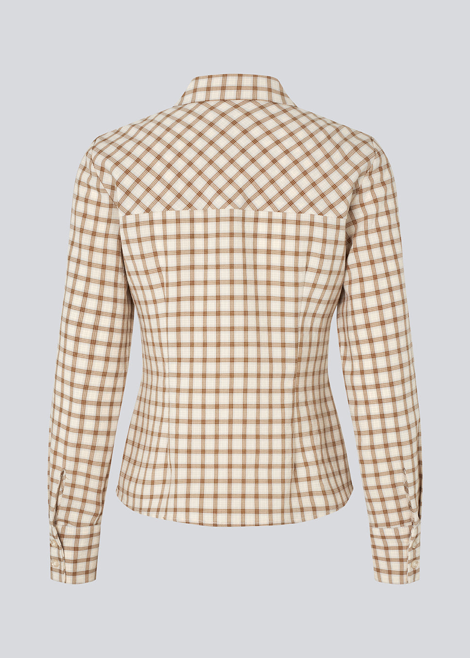 Klassisk figursyet skjorte i bomuldsblanding. TottieMD check shirt har en knappelukning fortil, skjortekrave og manchet med knappelukning.
