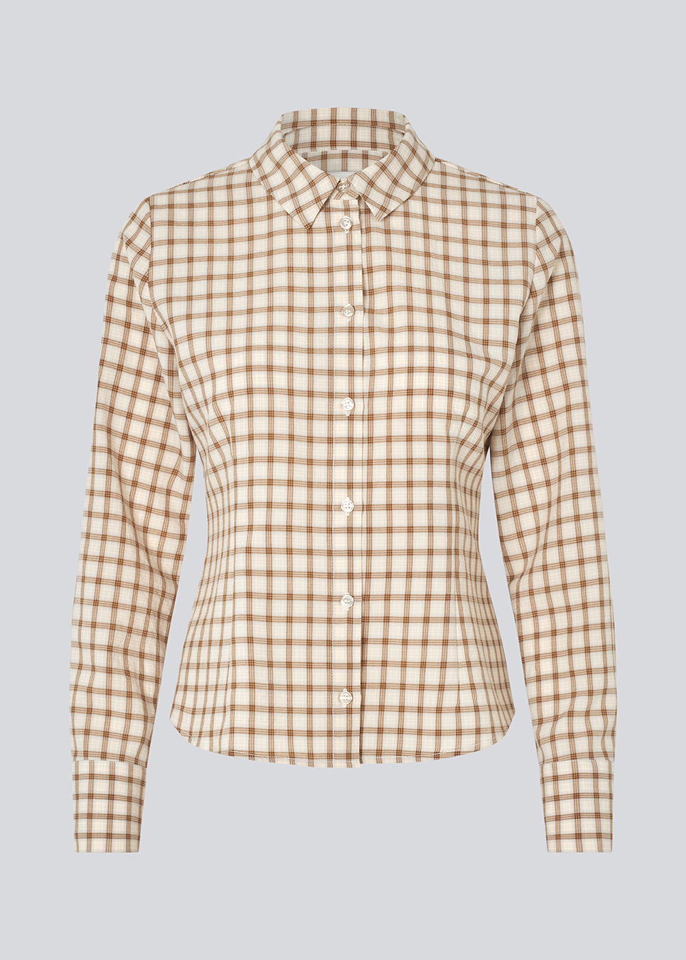 Klassisk figursyet skjorte i bomuldsblanding. TottieMD check shirt har en knappelukning fortil, skjortekrave og manchet med knappelukning.

