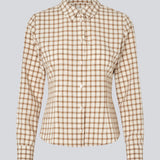 Klassisk figursyet skjorte i bomuldsblanding. TottieMD check shirt har en knappelukning fortil, skjortekrave og manchet med knappelukning.

