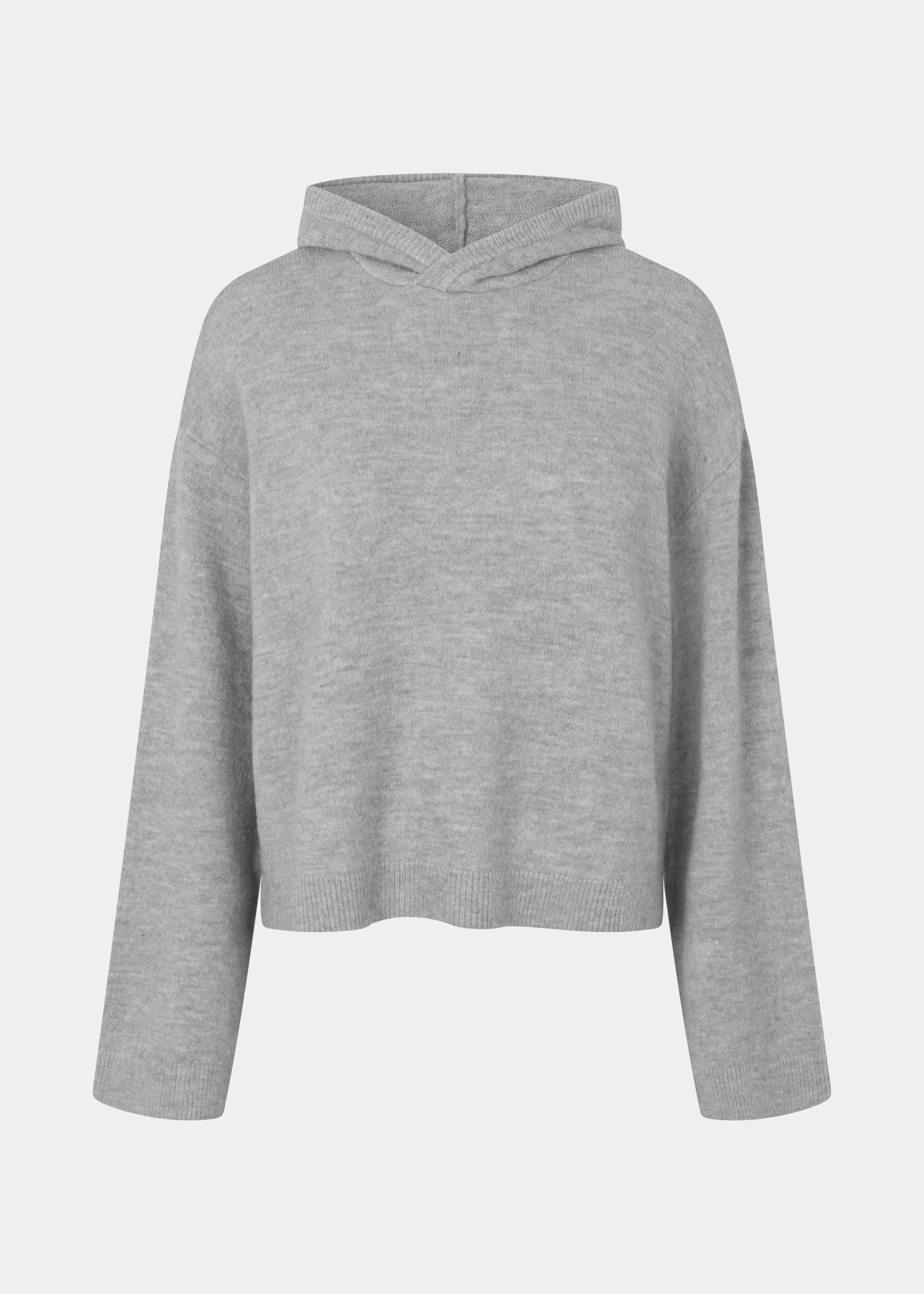 Treemd Hoodie er en blød strikhættetrøje med en afslappet pasform og et minimalistisk udtryk. Den lette kvalitet og den rummelige hætte gør den ideel som et komfortabelt lag til hverdagen, mens de ribstrikkede kanter tilfører en flot finish. Style den med jeans, skræddersyede bukser eller matchende strik for et afslappet look.