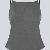 Ærmeløs top med tynde stropper. Tuesdaymd top har en åben ryg og justerbare stropper. Modellen er 175 cm og har en str s/36 på.

Style med matchende bukser: Tuesdaymd Pants.